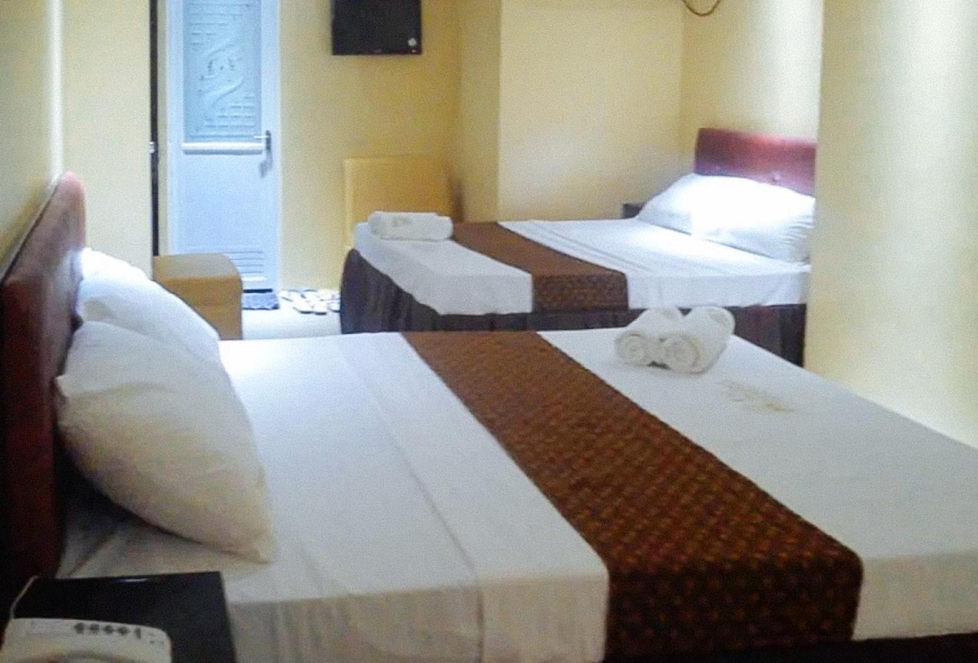 Reddoorz Plus @ Taj Hotel Tuguegarao Экстерьер фото