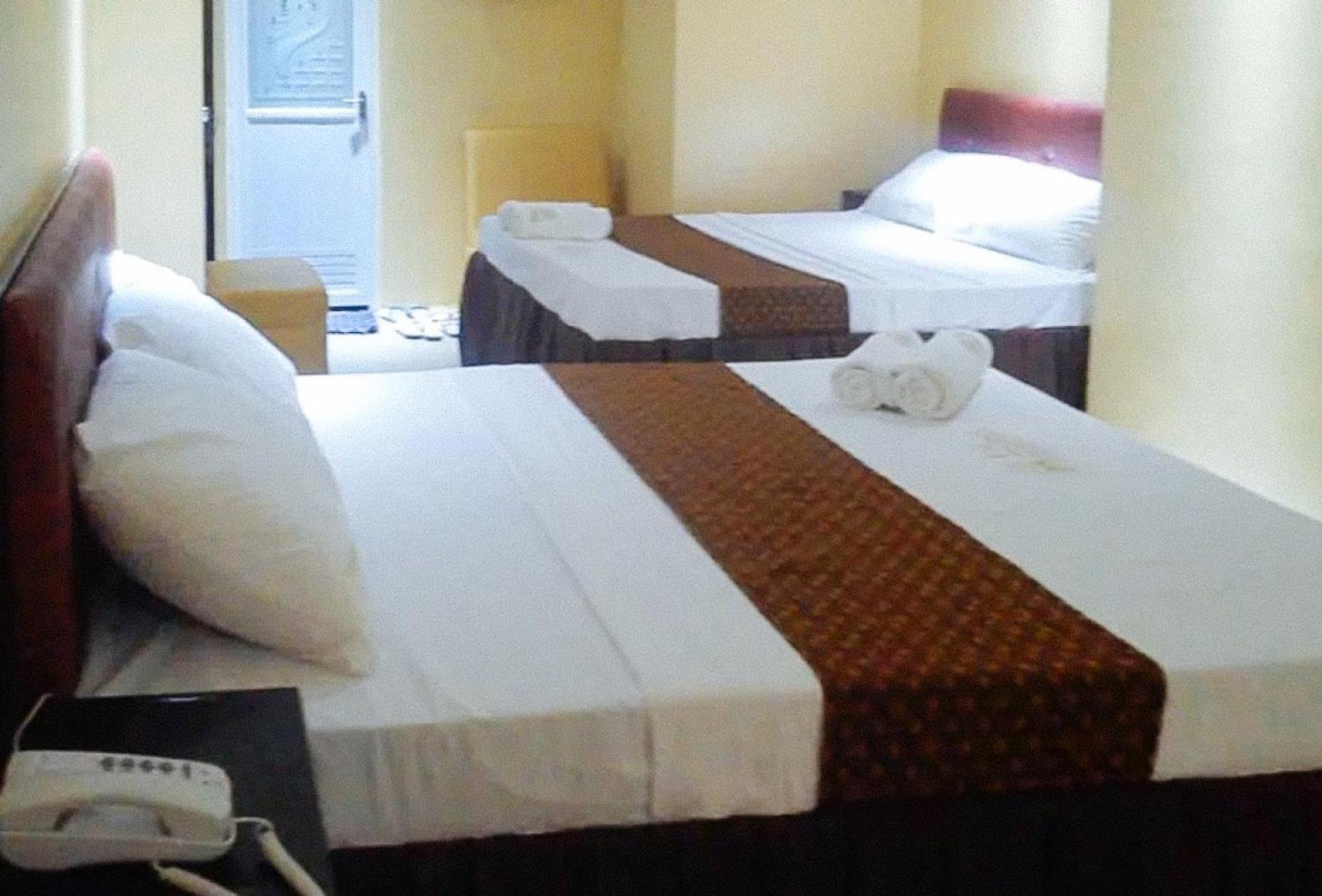 Reddoorz Plus @ Taj Hotel Tuguegarao Экстерьер фото